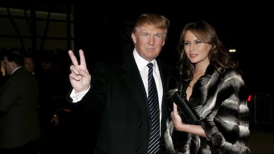 Donald Trump and Melania Trump, in a fur coat, attend a reception in honour of Prince Charles and Camilla, Duchess of Cornwall at The Museum of Modern Art in New York on November 1, 2005. EPA