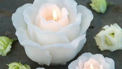 Candles, like these from www.nordichouse.co.uk, will create a spa-like look.