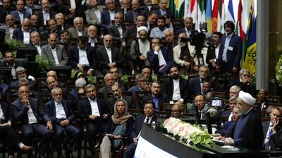 President Hassan Rouhani delivers a speech after being sworn in before parliament in Tehran.