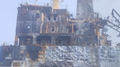 The charred wreckage of the Skylight vessel hit by a drone while anchored off Oman’s Khassab port, a day after the Iran war began. Photo: Sunil Pooniya