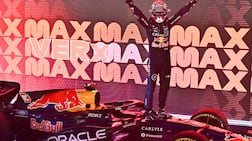Red Bull's Max Verstappen celebrates winning the Singapore Grand Prix. AFP