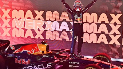 Red Bull's Max Verstappen celebrates winning the Singapore Grand Prix. AFP