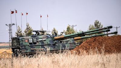 Turkish military tanks are seen during clashes between Turkish soldiers and ISIL fighters in the southern region of Gaziantep on September 3, 2016. Bulent Kilic / AFP