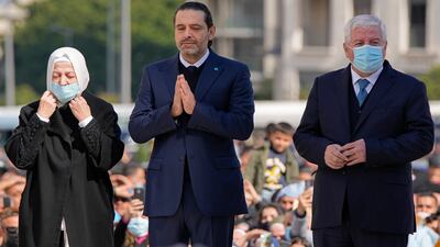 Former Lebanon prime minister Saad Hariri commemorates the 17th anniversary of his father Rafik's assassination by praying at his grave along with his aunt Bahia Hariri, left, and his uncle Chafik Hariri, in Beirut. Photo: AP