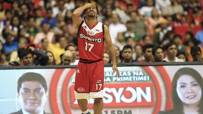 Manny Pacquiao reacts after being called for a foul during his professional basketball debut on Sunday in the Philippine Basketball Association. Romeo Ranoco / Reuters