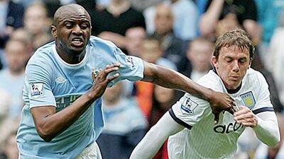 Manchester City's Patrick Vieira, left, knows how important it is to beat Spurs on Wednesday if the club are to finish fourth.