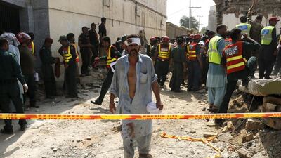 Police said the blast appeared to be a suicide attack, and it had caused the roof to cave in as the home minister of Punjab province, Shuja Khanzada, held meetings with about 20 people in his hometown of Attock. Reuters