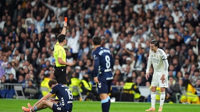 Referee Alejandro Quintero shows Alvaro Carreras of Real Madrid a red card. Getty Images