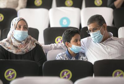 Families listening to stories of Sheikh Mohammed's 'My Little World'. Leslie Pableo / The National