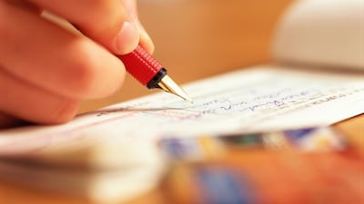 Amendments to the Federal Law on Commercial Transactions aim to discourage criminal lawsuits for bounced cheques. Getty Images