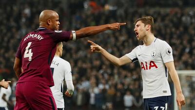 Manchester City's Vincent Kompany confronts Ben Davies after the Tottenham defender's foul. David Klein / Reuters