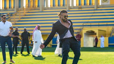 WWE Superstar Andrade shows off his football moves in Riyadh. Photo by Craig Melvin