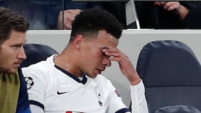 Dele Alli on the bench after coming off. AFP