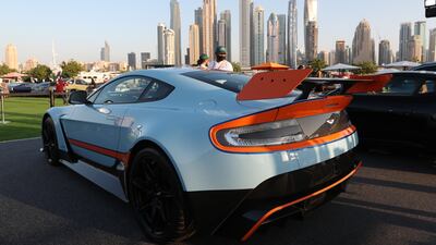 Visitors inspect the exhibition of NoFilterDXB outdoor urban motoring festival as the new phase of Dubai International Motor Show in Dubai, United Arab Emirates on 24 November 2021. NoFilterDXB festival is running from 24 till 27 November 2021. EPA / ALI HAIDER
