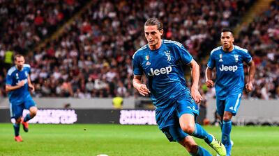 Juventus' midfielder Adrien Rabiot looks to make a break. AFP