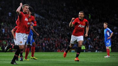 Manchester United’s interim manager Ryan Giggs, gave James Wilson, left, the start he deserved, and came on himself as a substitute at Old Trafford last night. Paul Ellis / AFP