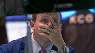 On the floor of the New York Stock Exchange, near the close of trading on Friday, October 10, 2014. US stocks closed out a turbulent week with another loss, giving the market its worst week since May 2012. Richard Drew / AP Photo
