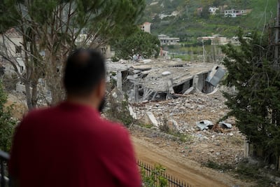 A man views the destruction in the village of Debbine on Sunday as displaced residents return to southern Lebanon during a 10-day ceasefire with Israel. Reuters