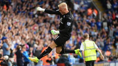 Kasper Schmeichel of Leicester City celebrates the goal scored by Chris Wood of Leicester City during the Barclays Premier League match between Leicester City and Everton at the King Power Stadium on August 16, 2014 in Leicester, England. (Photo by Ross Kinnaird/Getty Images)