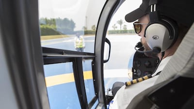 The helicopter was the French-made EC 130 B4, which was off the ground in seconds and soon heading out over the Gulf. Antonie Robertson / The National
