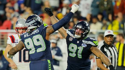 Seattle Seahawks' Leonard Williams and Byron Murphy II celebrate following their 29-13 win over New England Patriots at Super Bowl LX, played at Levi's Stadium, Santa Clara, California. Reuters