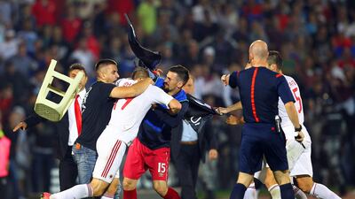 A brawl between players on the pitch marred their Euro 2016 qualifying match in Belgrade. Koca Sulejmanovic / EPA