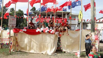 Locals greet the Duke and Duchess of Sussex as they arrive at Fua'amotu Airport in Nuku'alofa, Tonga. The Duke and Duchess of Sussex are on their official 16-day Autumn tour visiting cities in Australia, Fiji, Tonga and New Zealand. Getty Images