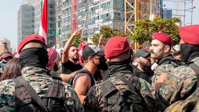 Soldiers and riot police intervened to separate anti-government protesters and supporters of the Amal and Hezbollah parties. AFP