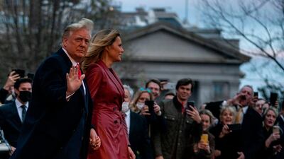 US President Donald Trump and First Lady Melania Trump walk to Marine One prior to departing from the South Lawn of the White House in Washington, DC. AFP