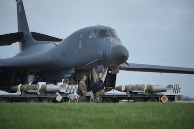 Ground crew prepare to load munitions onto a US Air Force B-1 bomber at RAF Fairford, England. Getty Images