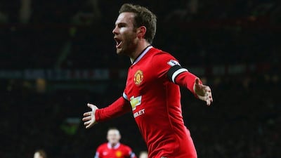 Juan Mata of Manchester United celebrates scoring the opening goal in his team's 3-0 FA Cup replay win at Old Trafford on Tuesday. Alex Livesey / Getty Images