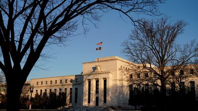 The headquarters of the US Federal Reserve, in Washington. Fed staff have assessed that the risk of a recession in the US has grown to almost 50-50. Reuters