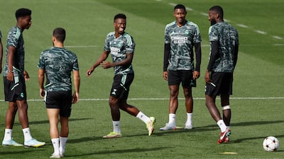 Soccer Football - Champions League - Real Madrid Training - Ciudad Real Madrid, Madrid, Spain - October 4, 2022 Real Madrid's Vinícius Junior, David Alaba and Antonio Rudiger during training REUTERS / Susana Vera
