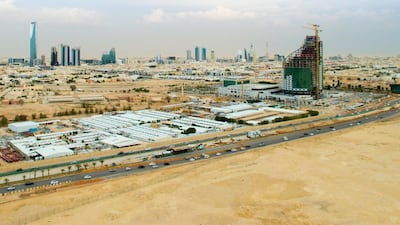 The Kingdom Tower, left background, stands in Riyadh, Saudi Arabia. Waseem Obaidi for The National