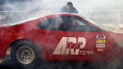 Tyre smoke rises from a Toyota Supra. Pawan Singh / The National