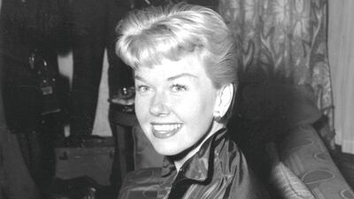 Doris Day attending a reception at Claridges Hotel in London, April 1955. Keystone / Getty Images