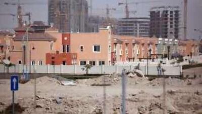 Completed and partially completed villas sit next to stalled projects in Dubai Sports City.