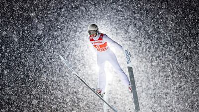 Daniela Haralambie of Romania during the women's FIS Ski Jumping World Cup in Engelberg, Switzerland. AP