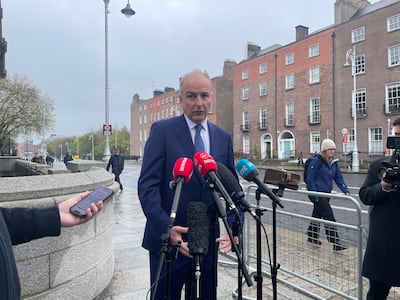 Taoiseach Micheal Martin outside the Government Buildings in Dublin. Grainne Ni Aodha/PA Wire