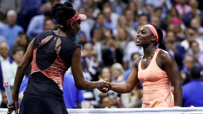 Sloane Stephens, right, shakes hands with Venus Williams after defeating her fellow American to reach the US Open final. Mike Segar / Reuters