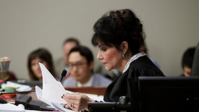 Judge Rosemarie Aquilina reads excerpts from the letter written by Larry Nassar during the seventh day of Nassar's sentencing hearing. AP Photo/Carlos Osorio