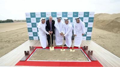 (L-R) Dr Abdulla Al Karam, Chairman of the Board of Directors and Director General of KHDA; Sir David Eastwood, Vice Chancellor of the University of Birmingham; Humaid Al Qutami, Director General of Dubai Health Authority; Dr Ahmad Al Falasi, UAE Minister for Higher Education and Advanced Skills, and Malek Al Malek, chief executive of Tecom, attend the ground-breaking ceremony for the expansion of the University of Birmingham Dubai. Chris Whiteoak / The National