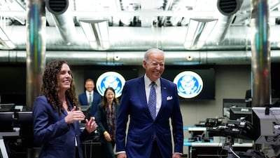 President Joe Biden talks with Christine Abizaid, director of the National Counter-terrorism Centre, during a visit to McLean, Virginia. AP