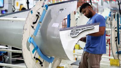 A Worker working on the parts for Airbus and Boeing in the Assembly section at the Strata Manufacturing facility in Al Ain. Pawan Singh/The National