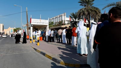 Citizens queue to vote in Manama during Bahrain's previous parliamentary election, on November 24, 2018. AFP