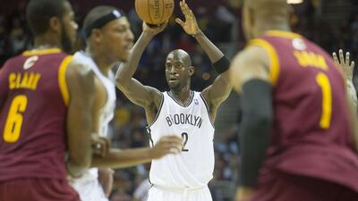 Kevin Garnett is part of the veteran movement initiated at the Brooklyn Nets by owner Mikhail Prokhorov to deliver an NBA title as soon as possible. Jason Miller / AFP