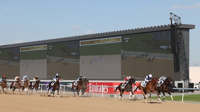 Jockey Silvestre De Sousa, right, guides Banishing to win in the Godolphin Mile. EPA