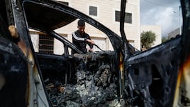 A burnt-out car after an Israeli settler attack in Al Mughayyir, near Ramallah. Reuters
