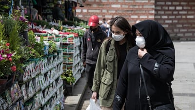 Local residents shop for flowers in the Eminonu district of Istanbul, Turkey. Bloomberg