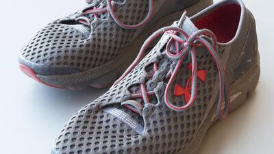 A pair of Under Armour SpeedForm Gemini 2 Record Equipped running shoes. The shoes contain an embedded chip to track exercise. Mark Lennihan / AP Photo